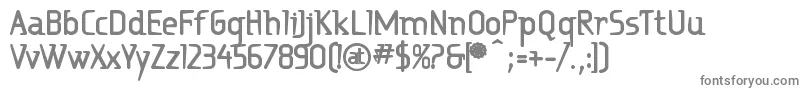 フォントRitaexb – 白い背景に灰色の文字