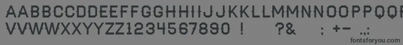 フォントHaymaker – 黒い文字の灰色の背景