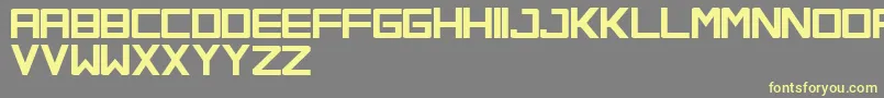 OrenaSoloMayusculas Font – Yellow Fonts on Gray Background