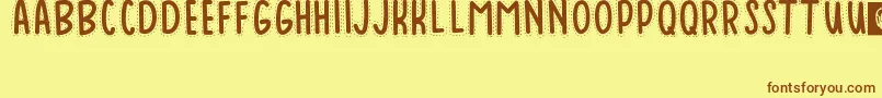 Baduy Font – Brown Fonts on Yellow Background