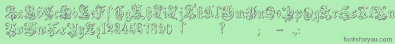 Zendaembossed-Schriftart – Graue Schriften auf grünem Hintergrund