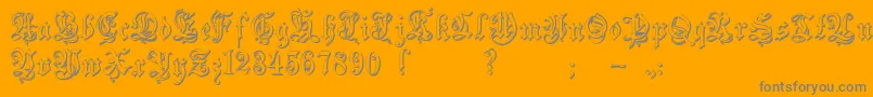 Zendaembossed-Schriftart – Graue Schriften auf orangefarbenem Hintergrund