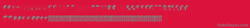 フォントProfilsdcoxy – 赤い背景に灰色の文字