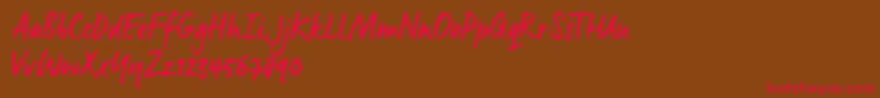 ManusSmoothTrial Font – Red Fonts on Brown Background