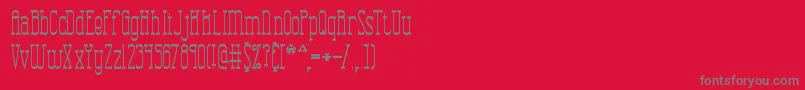 CombustionTallBrk-fontti – harmaat kirjasimet punaisella taustalla