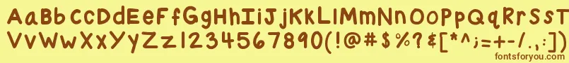 フォントKbchubby – 茶色の文字が黄色の背景にあります。