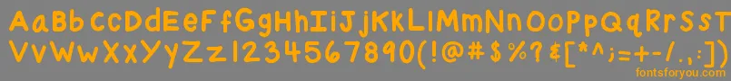 フォントKbchubby – オレンジの文字は灰色の背景にあります。