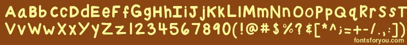Kbchubby-fontti – keltaiset fontit ruskealla taustalla