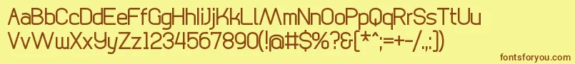 フォントDigicityRegular – 茶色の文字が黄色の背景にあります。