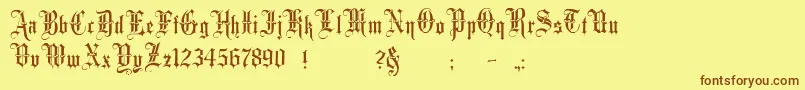 フォントMinsterNo3 – 茶色の文字が黄色の背景にあります。