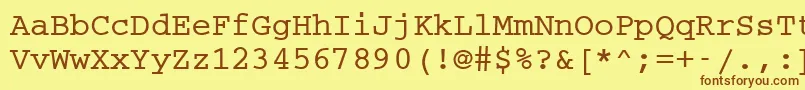 フォントCc50016m – 茶色の文字が黄色の背景にあります。