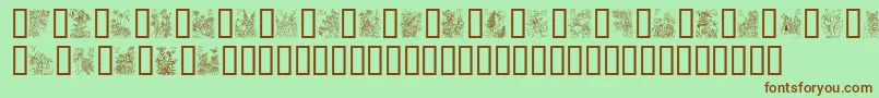 フォントFlowerAndFairyAlphabet – 緑の背景に茶色のフォント