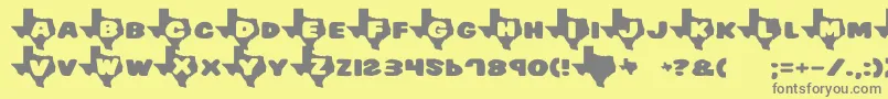 フォントTexas7 – 黄色の背景に灰色の文字