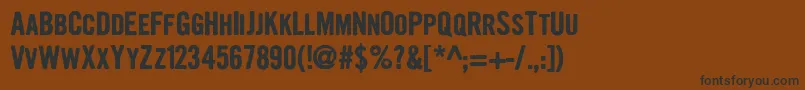 GrowlyGrin Font – Black Fonts on Brown Background