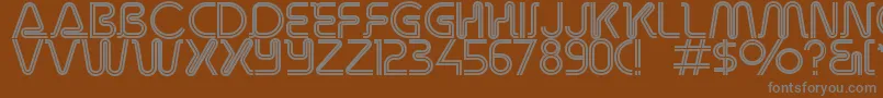 Шрифт Overdriveinlinealternate – серые шрифты на коричневом фоне