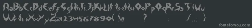 フォントTattooHeavy – 黒い背景に灰色の文字