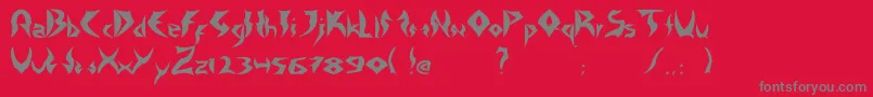 TattooHeavy-fontti – harmaat kirjasimet punaisella taustalla