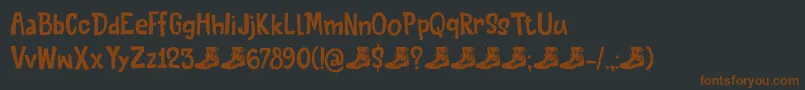 QuiteSomethingDemo-fontti – ruskeat fontit mustalla taustalla