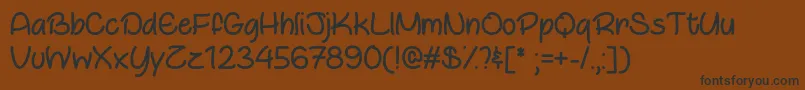 OtterlyAdorableOtf Font – Black Fonts on Brown Background