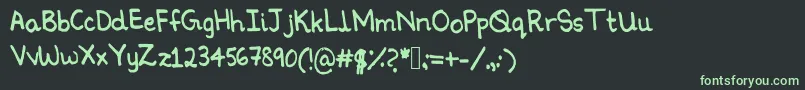 フォントNinoshandwriting – 黒い背景に緑の文字