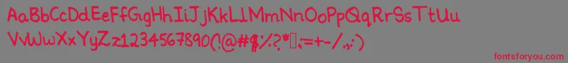 フォントNinoshandwriting – 赤い文字の灰色の背景