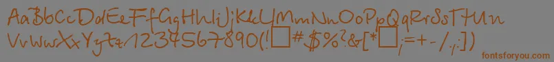 Шрифт Betinascript – коричневые шрифты на сером фоне
