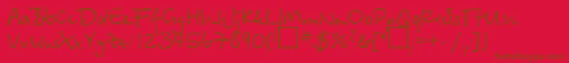 Betinascript Font – Brown Fonts on Red Background