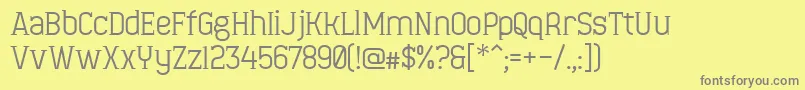 MinaeffEct-fontti – harmaat kirjasimet keltaisella taustalla