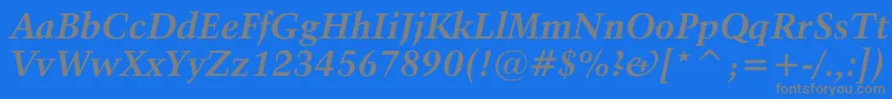 フォントActivaBoldital – 青い背景に灰色の文字