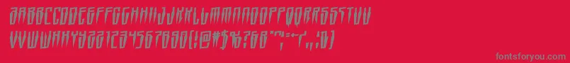 Swordtoothrotal-fontti – harmaat kirjasimet punaisella taustalla