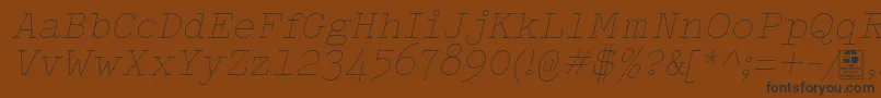 Шрифт TypowriterThinItalicDemo – чёрные шрифты на коричневом фоне