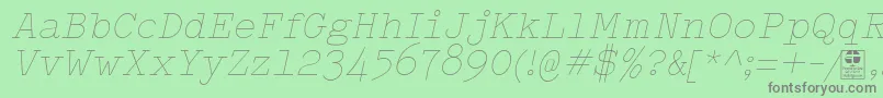 TypowriterThinItalicDemo Font – Gray Fonts on Green Background