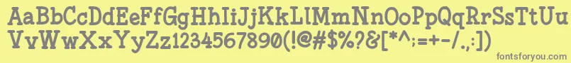 フォントFonesiaBold – 黄色の背景に灰色の文字