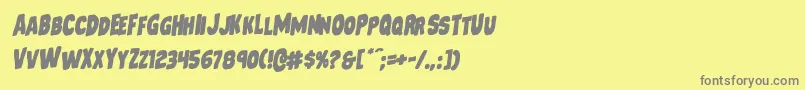 フォントMysterymobilerotal – 黄色の背景に灰色の文字