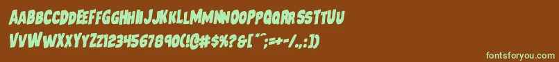 フォントMysterymobilerotal – 緑色の文字が茶色の背景にあります。