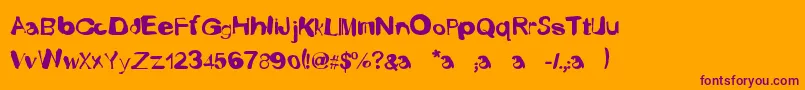 FustyLuggs Font – Purple Fonts on Orange Background