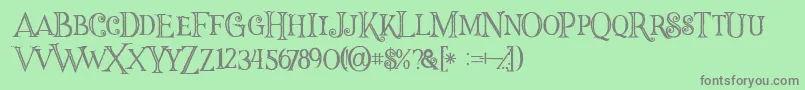 フォントHalloweninline – 緑の背景に灰色の文字