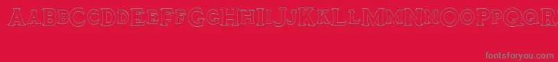 Tinplatetitling Font – Gray Fonts on Red Background