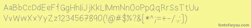 EkasAndroidHandwriting Font – Gray Fonts on Yellow Background