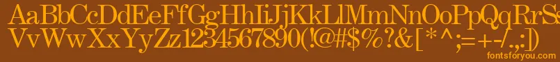 フォントFastRegularTtstd – オレンジ色の文字が茶色の背景にあります。