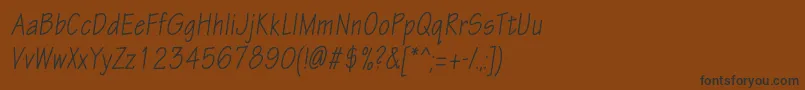 fuente EskiztwocondcItalic – Fuentes Negras Sobre Fondo Marrón