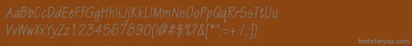 フォントEskiztwocondcItalic – 茶色の背景に灰色の文字