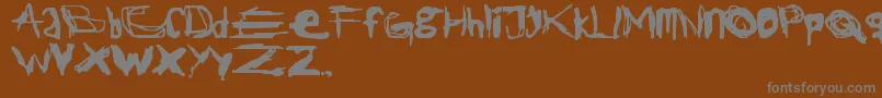 JackTheRipper-fontti – harmaat kirjasimet ruskealla taustalla