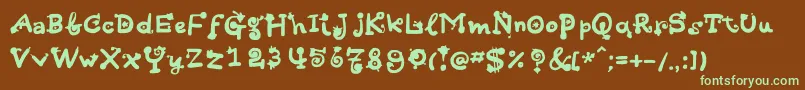 フォントHotsaucec – 緑色の文字が茶色の背景にあります。
