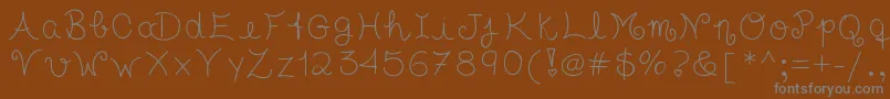 Tasteofchildhood-fontti – harmaat kirjasimet ruskealla taustalla