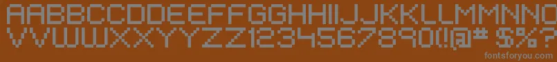 EivenMajor-Schriftart – Graue Schriften auf braunem Hintergrund