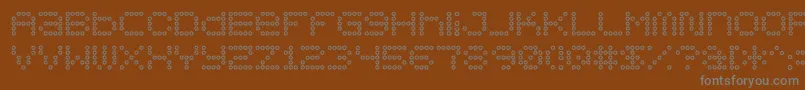 フォント5x5DotsOutline – 茶色の背景に灰色の文字