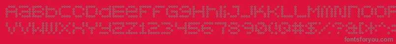 Czcionka 5x5DotsOutline – szare czcionki na czerwonym tle