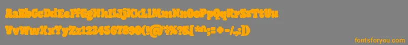 GiantHeadRegularOt Font – Orange Fonts on Gray Background