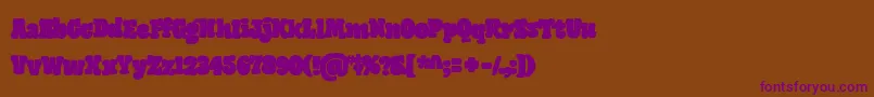 GiantHeadRegularOt Font – Purple Fonts on Brown Background